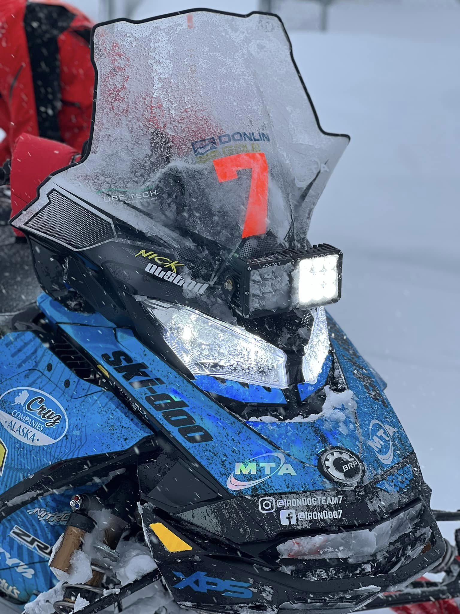 Team 7’s Nick Ousted pulled into Kaltag with an ice-covered sled on Wednesday. All teams were experiencing heavy, wet snow and warm conditions. Team 7 maintains their current lead. Trinity Vivieros photo.