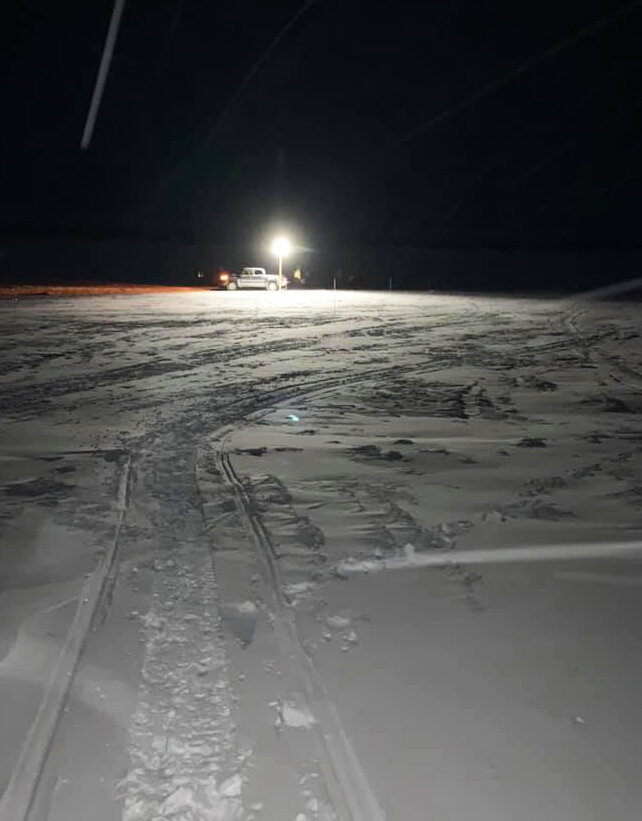 Noorvik volunteers waited in a snowy dark morning for the first racers to arrive from Kotzebue. Source: Iron Dog Facebook Group / Sophie Cleveland
