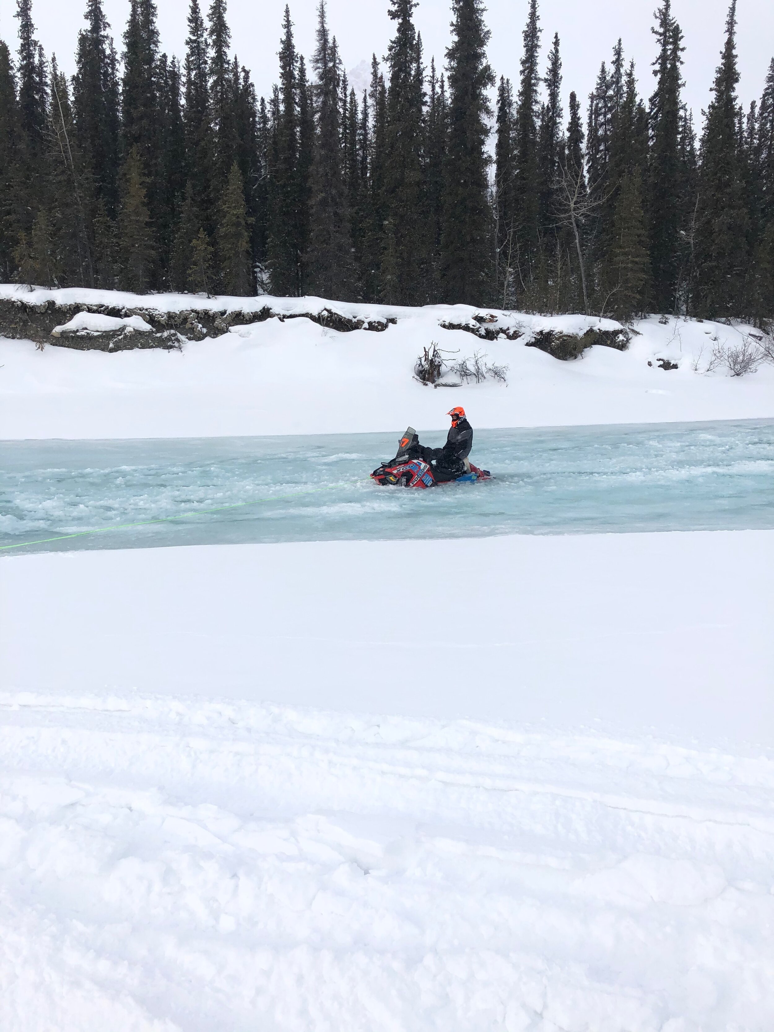 Team 37 racer Mark Fosty went into overflow in the south fork of the Kuskokwim River and Team 22, Tyler Samuelson and Jonathan Egrass, and Team 24, Luke and Konrad Schruf, helped pull him out. The three teams arrived in Big Lake late Saturday night.