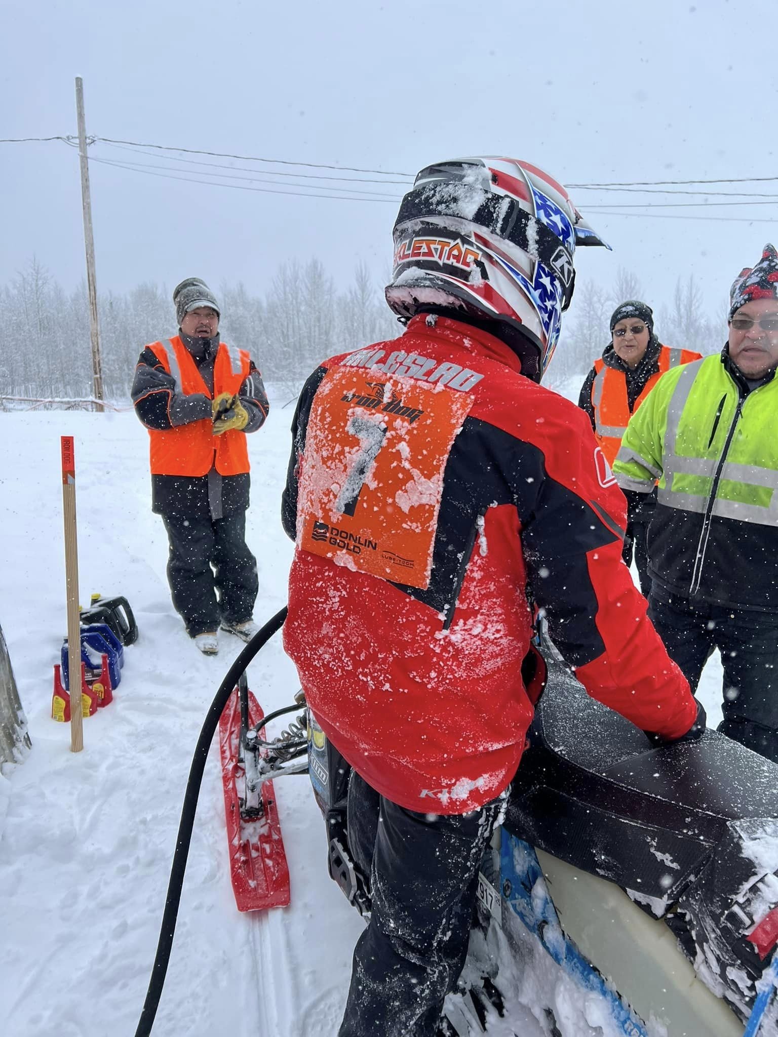 Team 7’s Tyler Aklestad, like everyone else on Wednesday, arrived in Kaltag covered in ice. Team 7 planned a seven-hour layover before pushing on — assuming the continued storm doesn’t change their strategy. Trinity Vivieros photo
