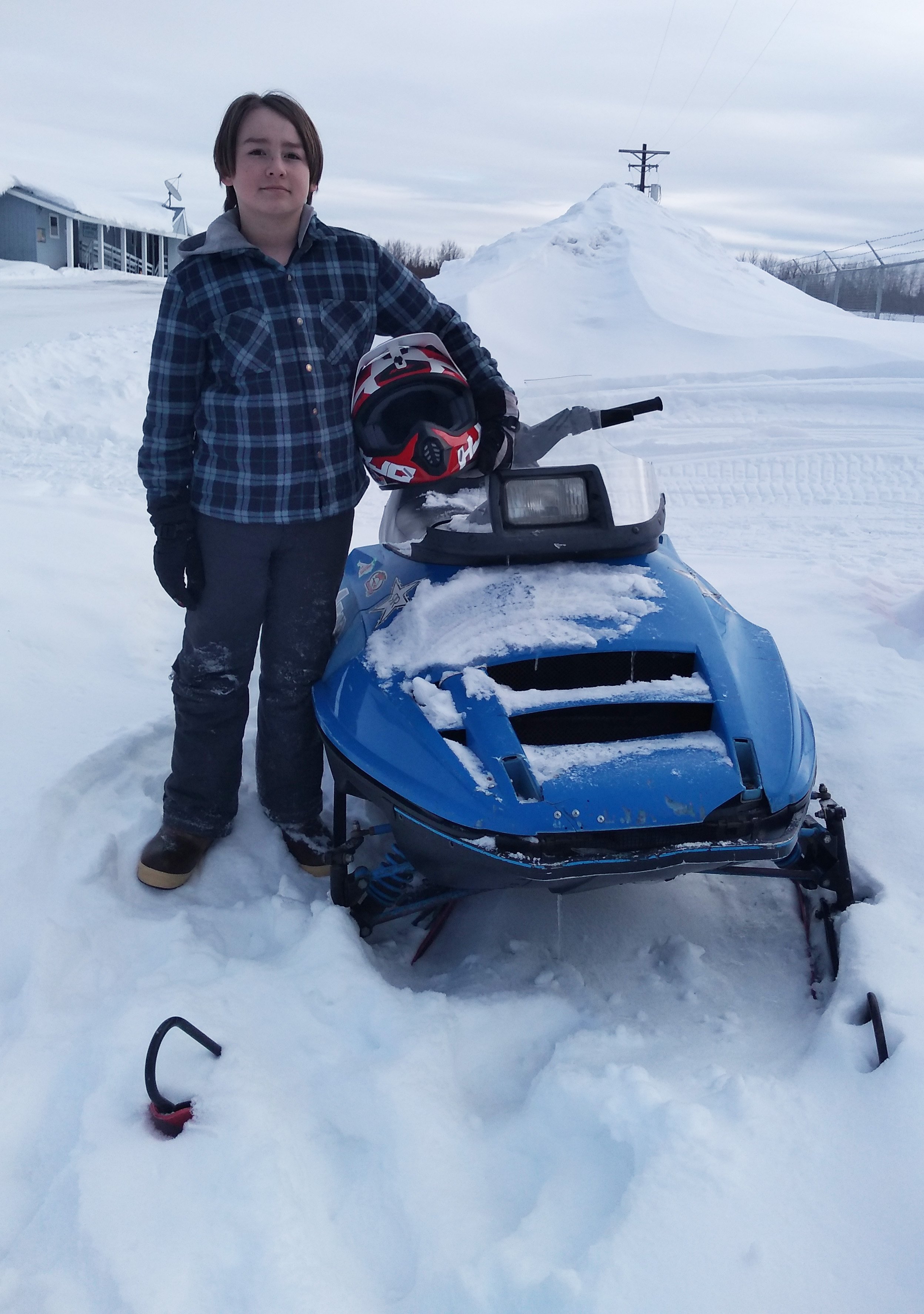 Jerry Greenamyre was wearing his new full-face helmet, given to him during an Iron Dog helmet giveaway just three weeks earlier, when he crashed into a moose March 6 while driving through town. The McGrath sixth-grader’s mother and principal say that helmet could have saved his life. Photo courtesy Miki Greenamyre