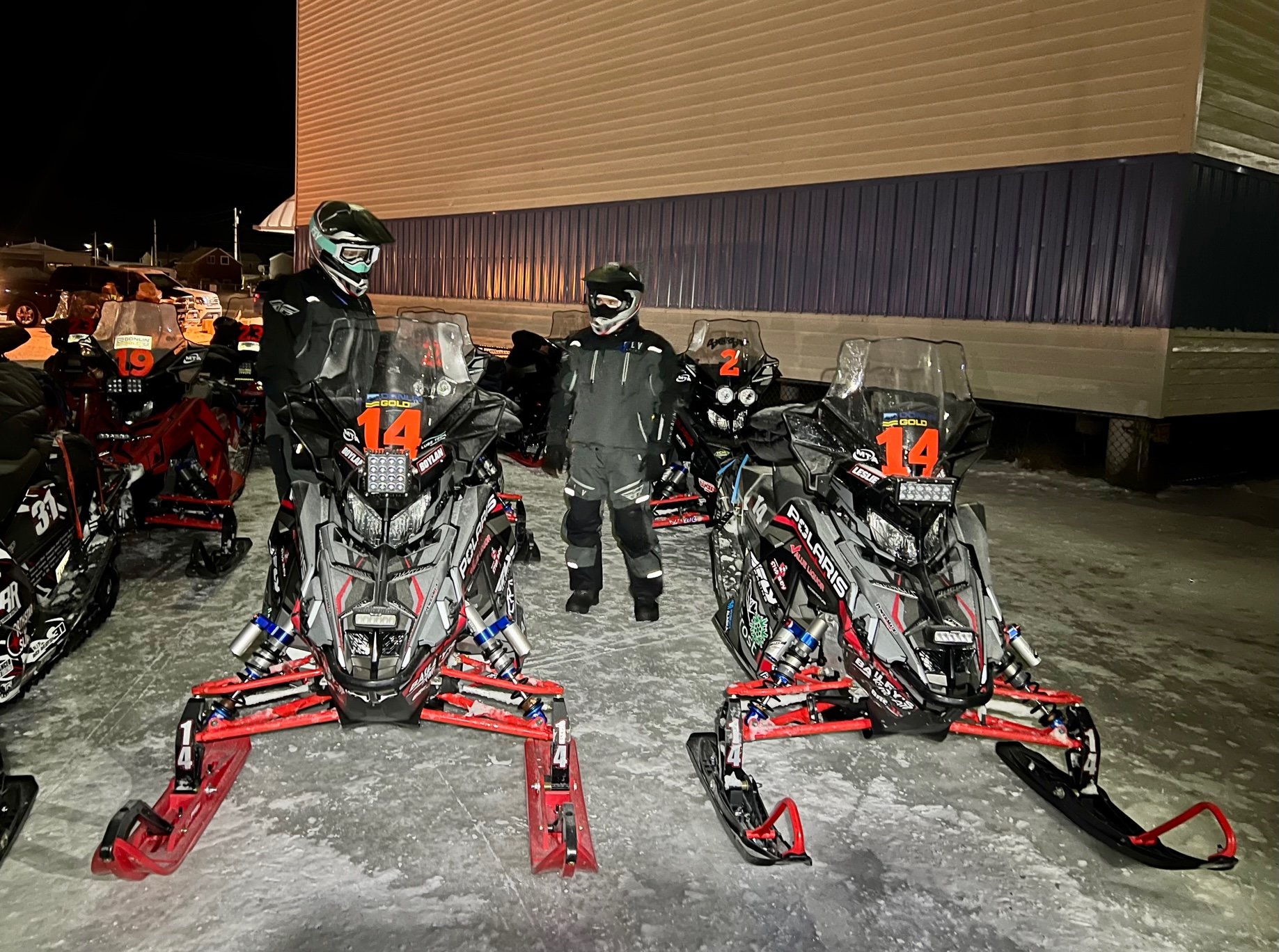 Team 14 Casey Boylan and Bryan Leslie prep to depart Kotzebue early Monday morning. They maintain a 16-minute lead over Team 39.
