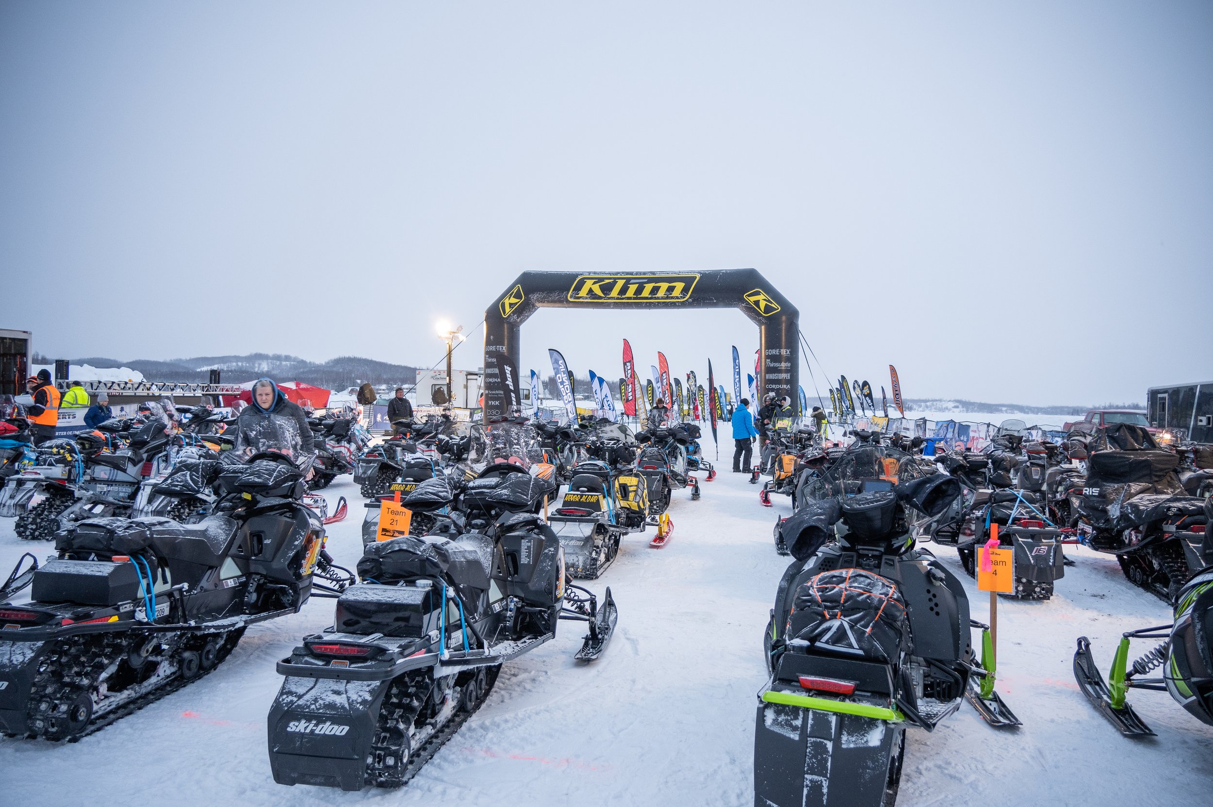 Sleds sit ready for the start of the 2023 Iron Dog Snowmobile Race. The 40th running begins Feb. 17, 2024.
