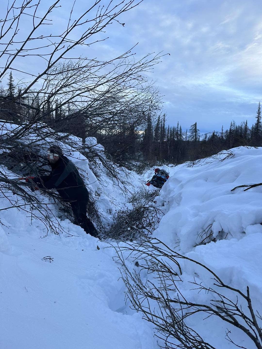 Team 7 spent a good part of Dec. 26 putting in the trail to Happy River. Iron Dog 2022 champion Tyler Aklestad said it’s the most trees he has ever seen down in the area.