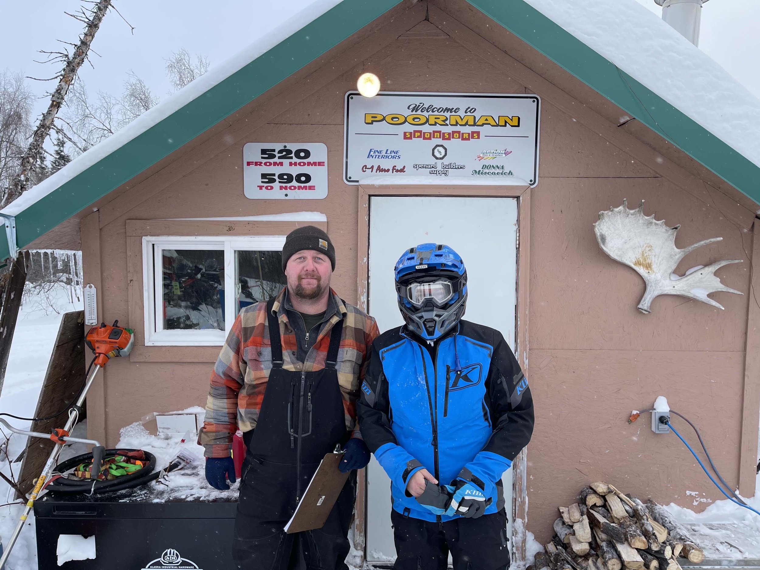 Volunteer Drew Wessels and Ambassador Team 77 member Roger Brown at the Poorman checkpoint. Courtesy Roger Brown